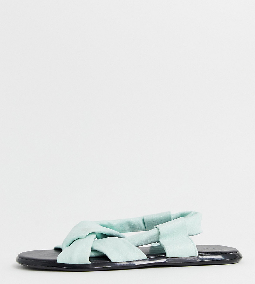 Co Wren – Wide fit – Pastellfärgade sandaler med knut-Grön