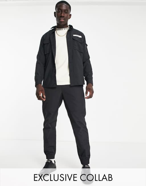 Collaborazione esclusiva Polo Ralph Lauren x ASOS - Pantaloncini in tessuto ripstop neri con cintura e logo 