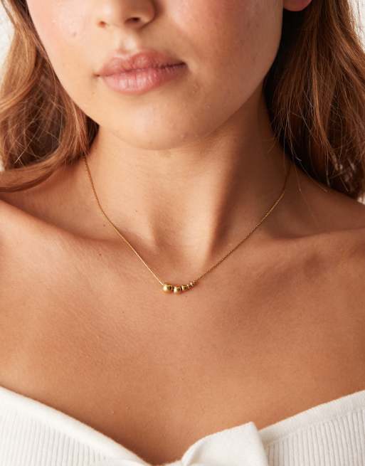 Collar con colgante de esferas de distintos tamaños de acero inoxidable chapado en oro de 18 quilates de Lost Souls