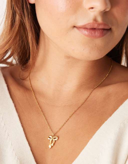 Collar con colgante de lazo de acero inoxidable chapado en oro de 18 quilates de Lost Souls