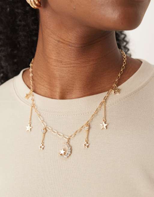 Collar dorado con charms de estilo celestial de DesignB London