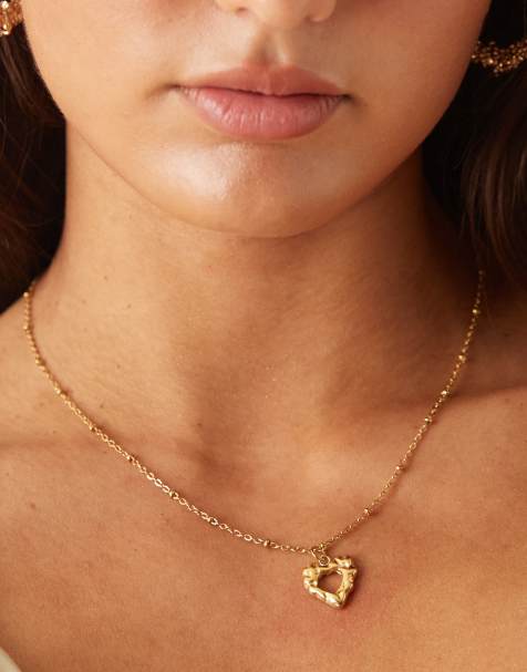 Collar dorado con colgante de corazón efecto fundido de acero inoxidable resistente al agua de ASOS DESIGN - view 1