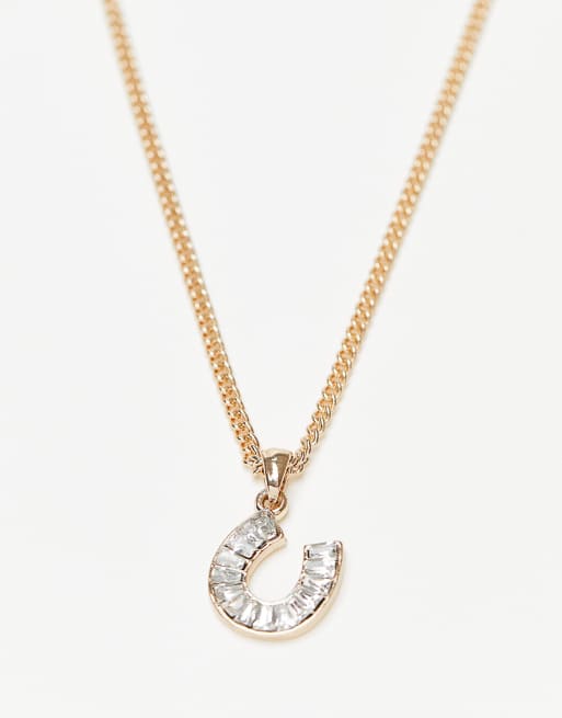 Collar dorado con colgante de herradura de Topshop