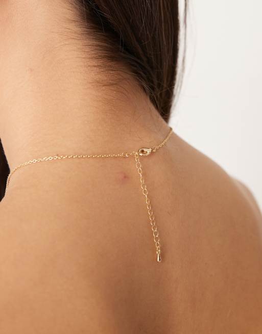 Collar dorado con colgante de ojo de tigre de DesignB London, 4 de 4