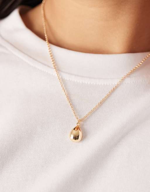 Collar dorado con colgante efecto fundido de DesignB London