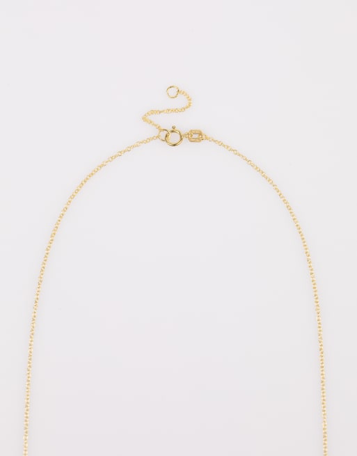 Collar dorado con cruz con circonitas de plata de ley chapado en oro de Lovisa , 3 de 3