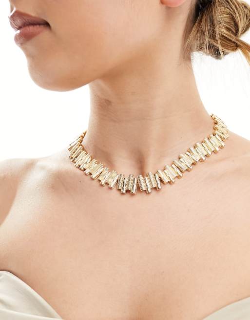 Collar dorado con diseño de barras texturizadas de ASOS DESIGN