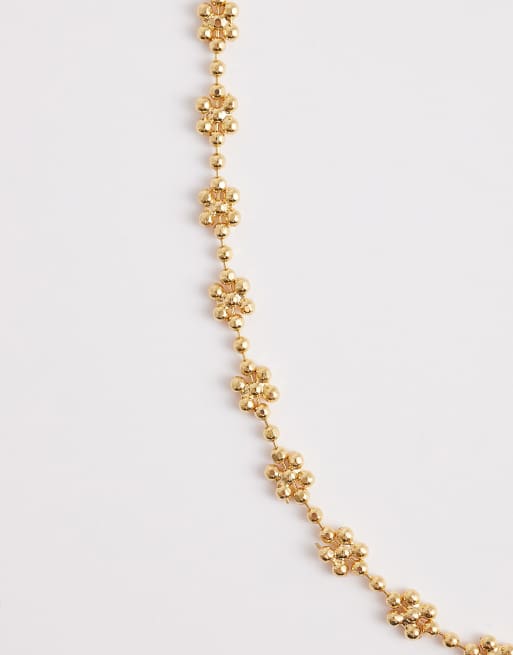 Collar dorado con diseño de flor delicada Bryella de ALDO, 3 de 4