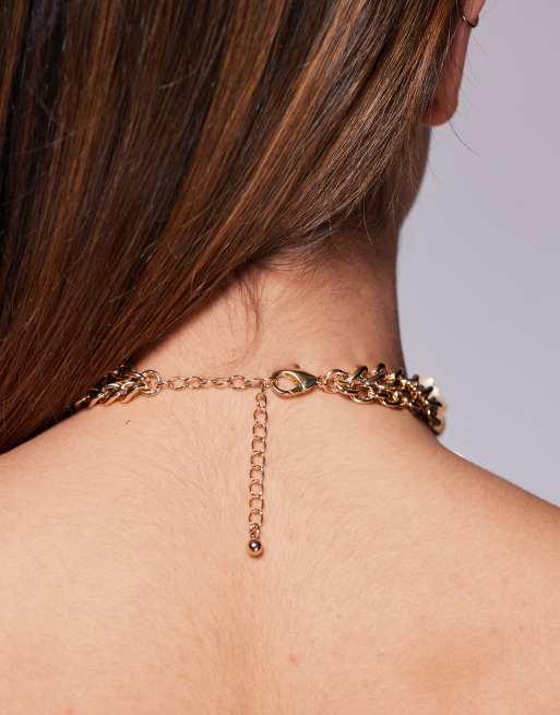 Collar dorado con diseño de flores de hilo metálico de edición limitada de ASOS DESIGN, 2 de 3