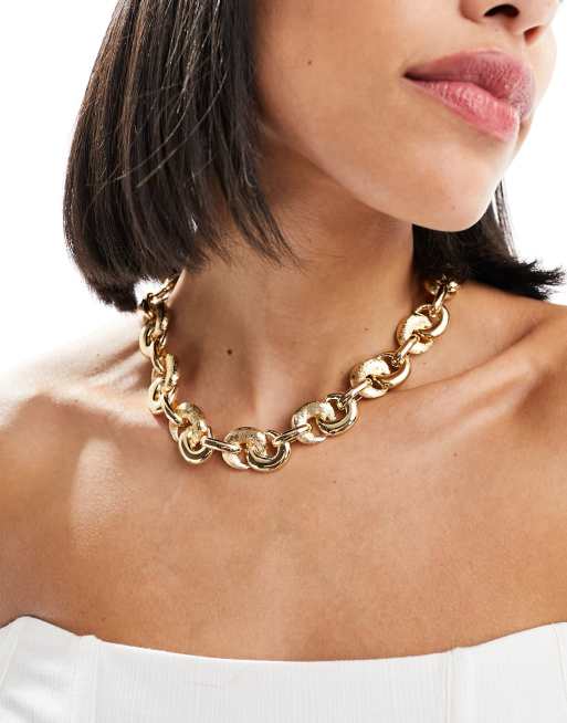 Collar dorado de cadena con eslabones gruesos de Mango