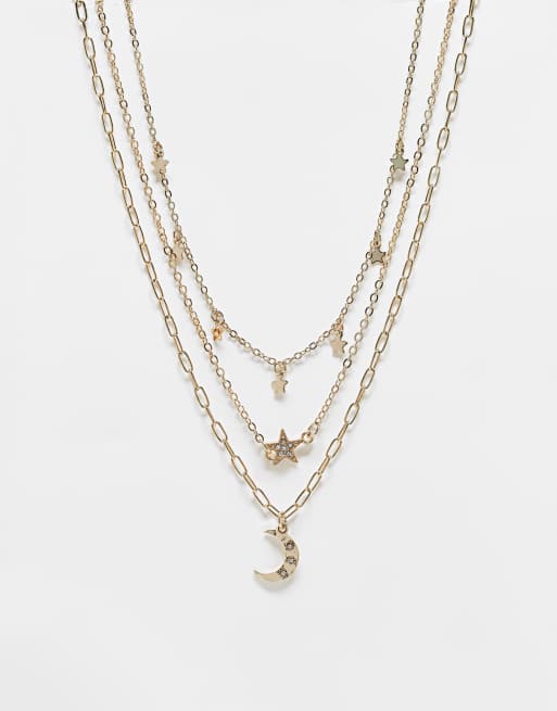 Collar dorado de varias hileras con charms celestiales de River Island