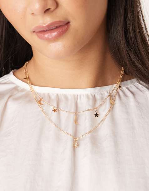 Collar dorado de varias hileras con colgantes de lunas y estrellas de DesignB London - view 1