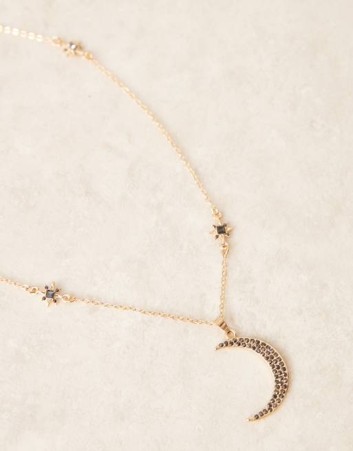 Collar largo dorado con diseño celestial de cristales de DesignB London, 2 de 4