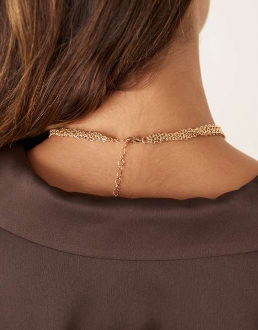Collares dorados de varias hileras con colgante de perla y borla de DesignB London, 3 de 3