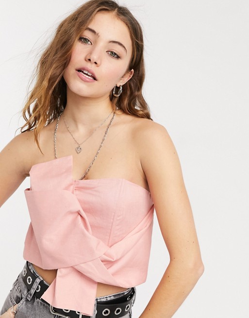 Collective the Label bow origami statement top in rose gold