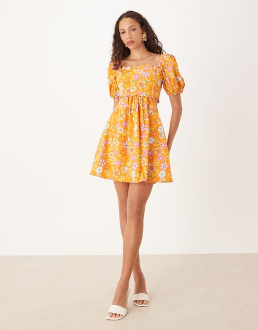 Collective The Label Empire line cut out dress in tan bright floral