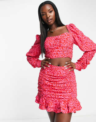 Collective the Label exclusive ruched frill mini skirt co-ord in pink and red leopard print - view 1