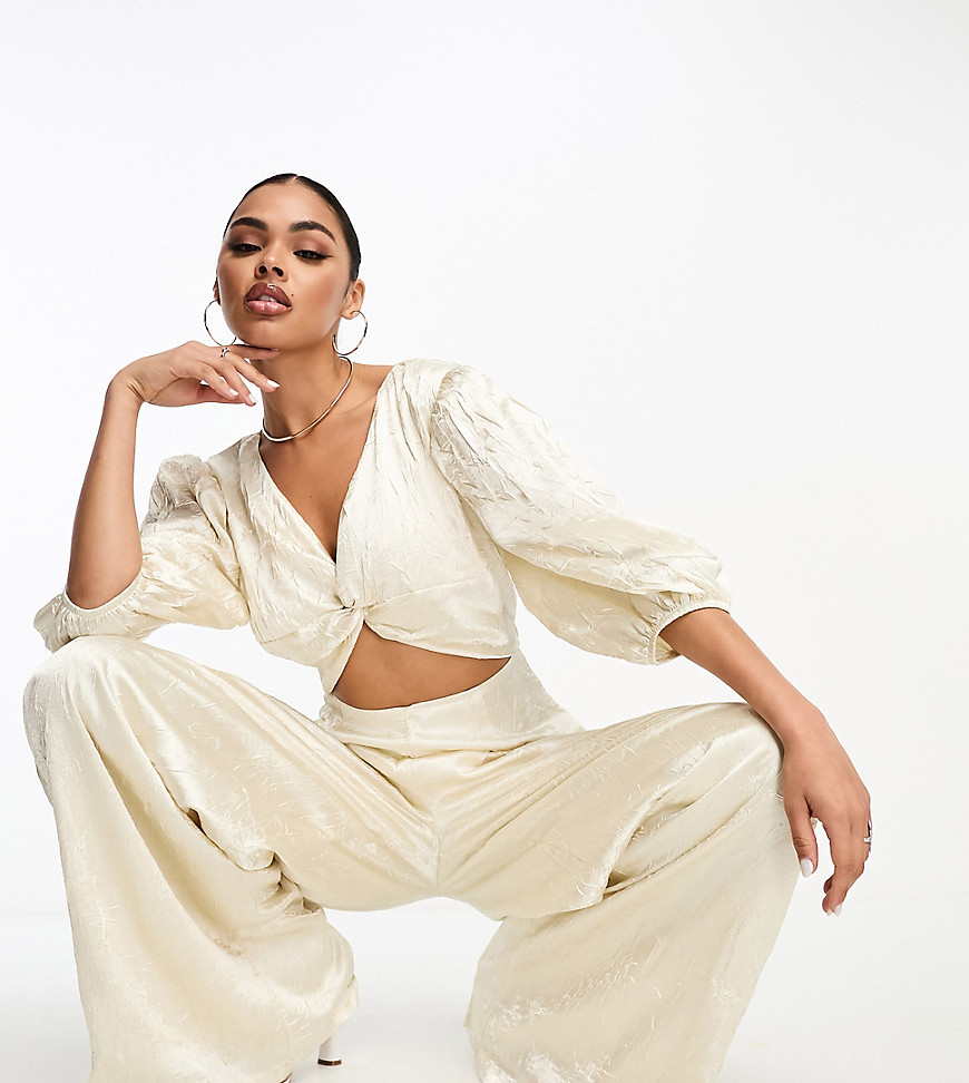Collective the Label exclusive twisted cut-out jumpsuit in oyster-White