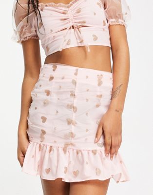 Collective the Label exclusive mini skirt co-ord in blush glitter heart