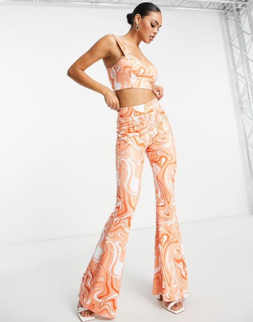 Collective The Label - Exclusives - Flare-broek met retro wervelprint, deel van co-ord set