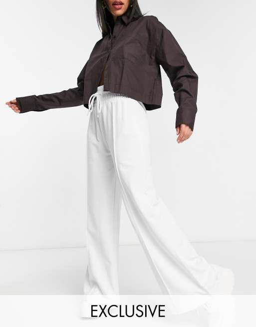 https://images.asos-media.com/products/collusion-90s-dad-wide-leg-sweatpants-with-front-seam-in-white/22941556-1-white?$n_640w$&wid=513&fit=constrain