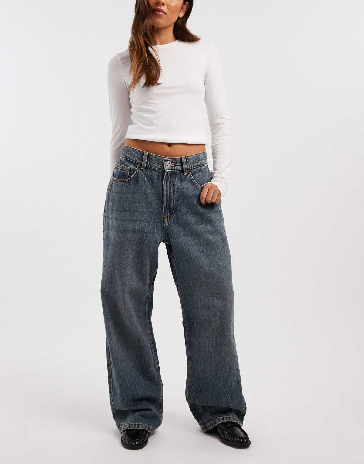 COLLUSION antifit mid rise jean in mid blue marble