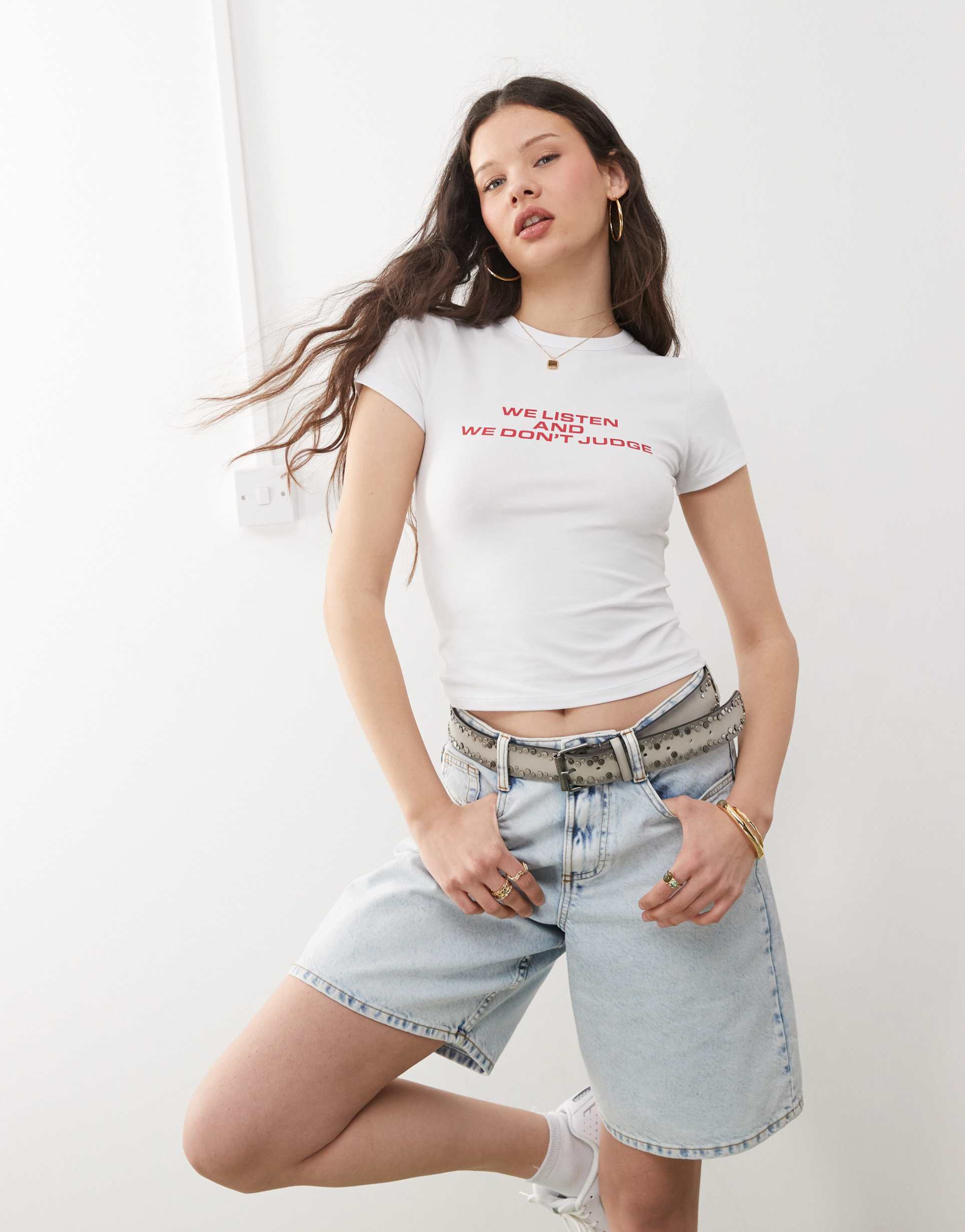 collusion baby tee in white with listen don't judge graphic