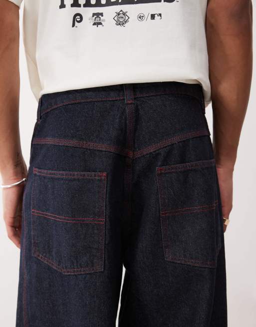 COLLUSION baggy jeans with turn-up hem in rinse wash