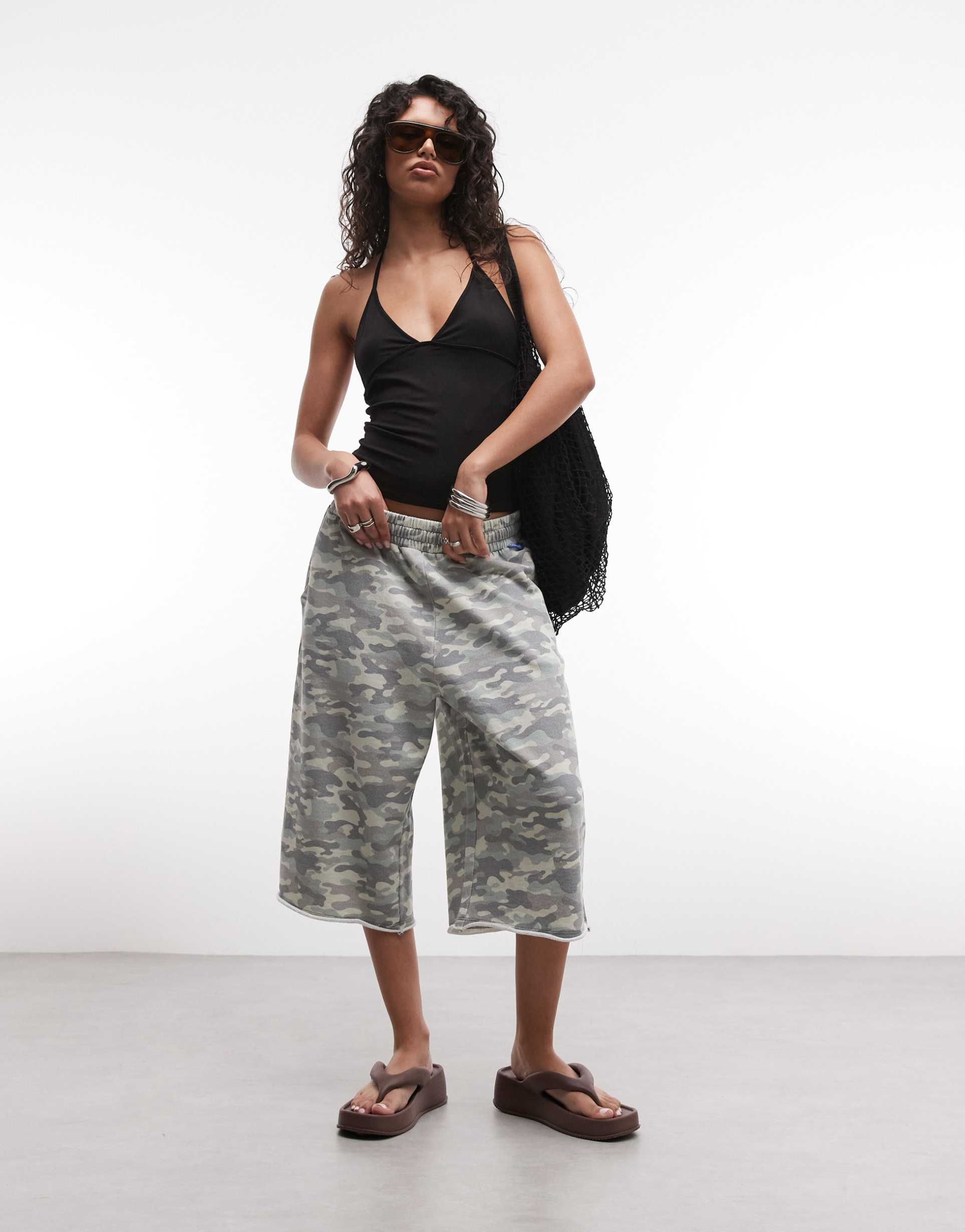 collusion baggy longline jersey shorts in washed camo
