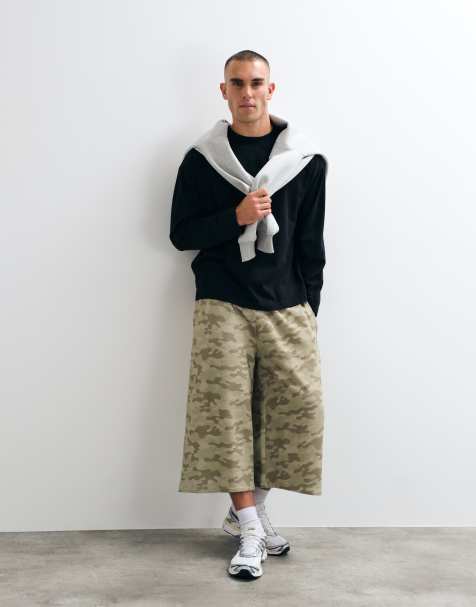 COLLUSION baggy longline shorts in camo print - view 1