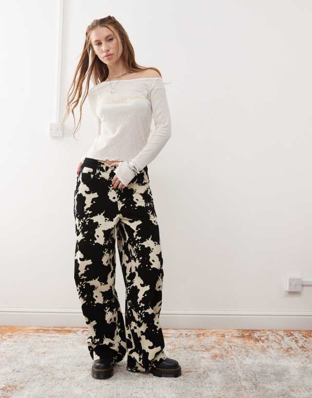 COLLUSION baggy pants in cow print | ASOS