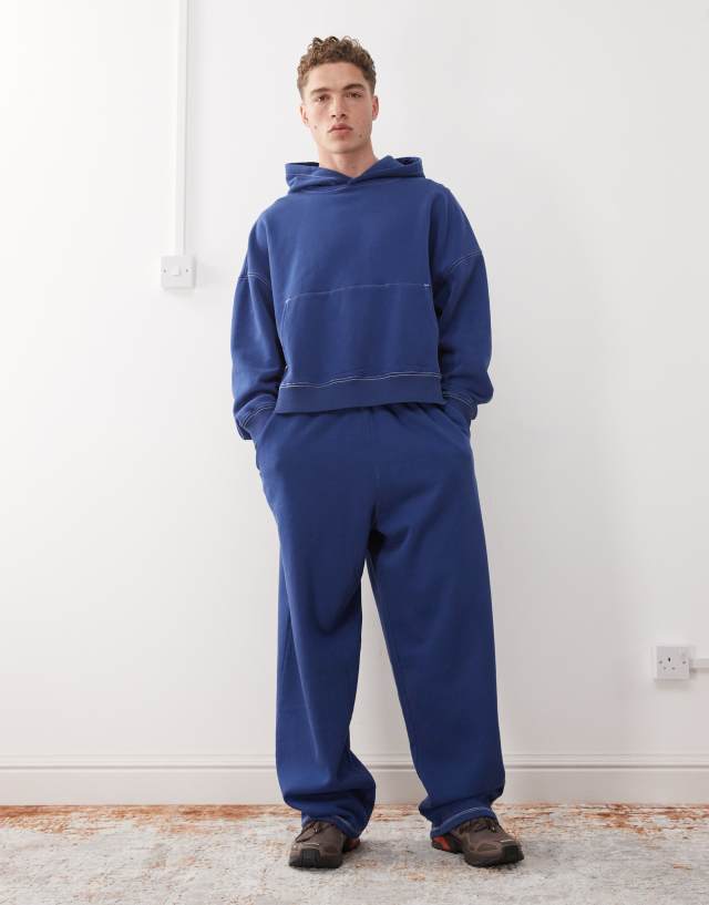 COLLUSION baggy relaxed sweatpants in washed navy | ASOS
