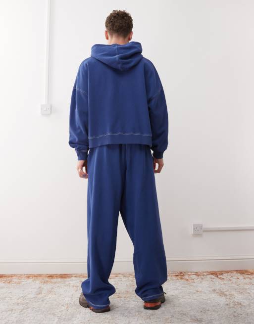 COLLUSION baggy relaxed sweatpants in washed navy