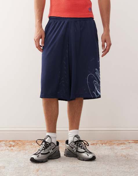 COLLUSION - Basketball skatershorts in blauw - view 1