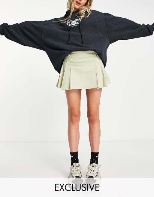 COLLUSION – Beige, plisserad minikjol i twill