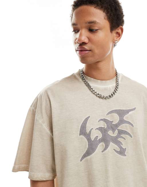 COLLUSION – Beige tvättad t-shirt med applikation