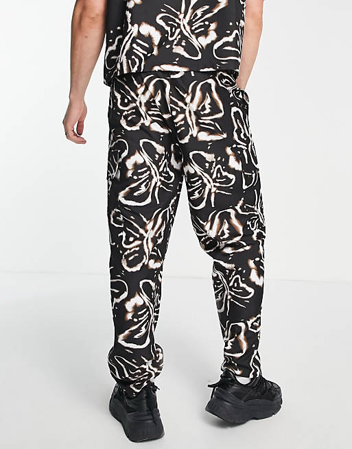 COLLUSION bleach butterfly pattern y2k pants - part of a set | ASOS