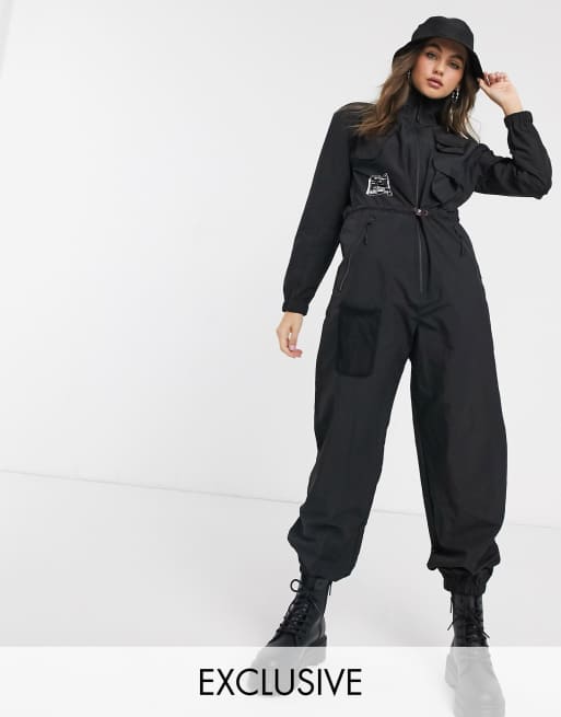 Nike Swoosh Plus utility jumpsuit in black