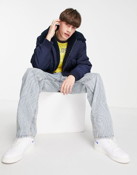 https://images.asos-media.com/products/collusion-bomber-puffer-jacket-with-sherpa-trims-in-navy/201016687-4?$n_550w$&wid=550&fit=constrain