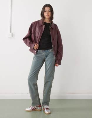 COLLUSION - Bootcut-Jeans in Dirty-Blau mit niedrigem Bund und Slim Fit