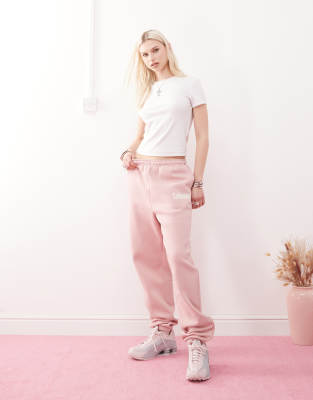 branded cuffed sweatpants - part of a set-pink