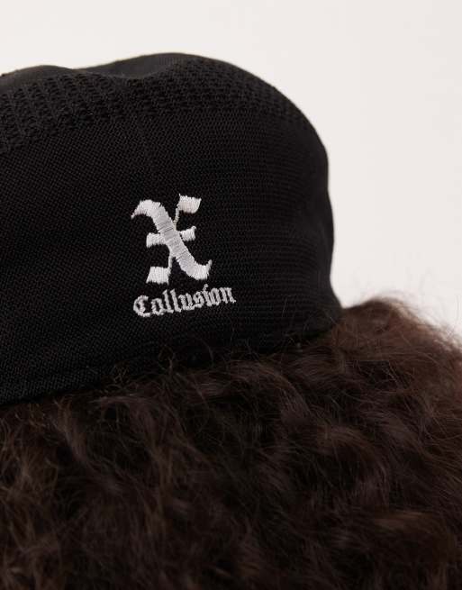 COLLUSION branded flap cap in black