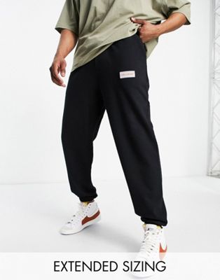 COLLUSION branded joggers in black co-ord