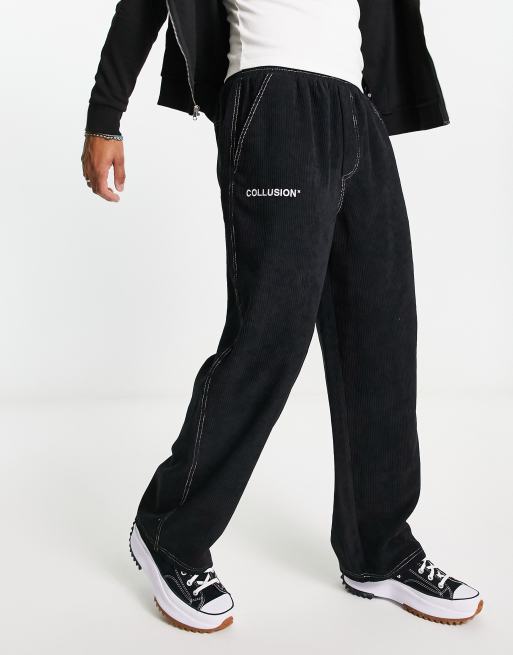 COLLUSION - Broek van corduroy met skater-pasvorm en borduursels in zwart