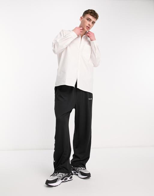 COLLUSION - Camicia oversize bianca con spalle scivolate