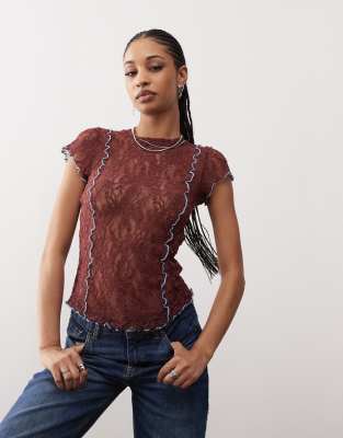 cap sleeve lace top in brown with contrast blue seam