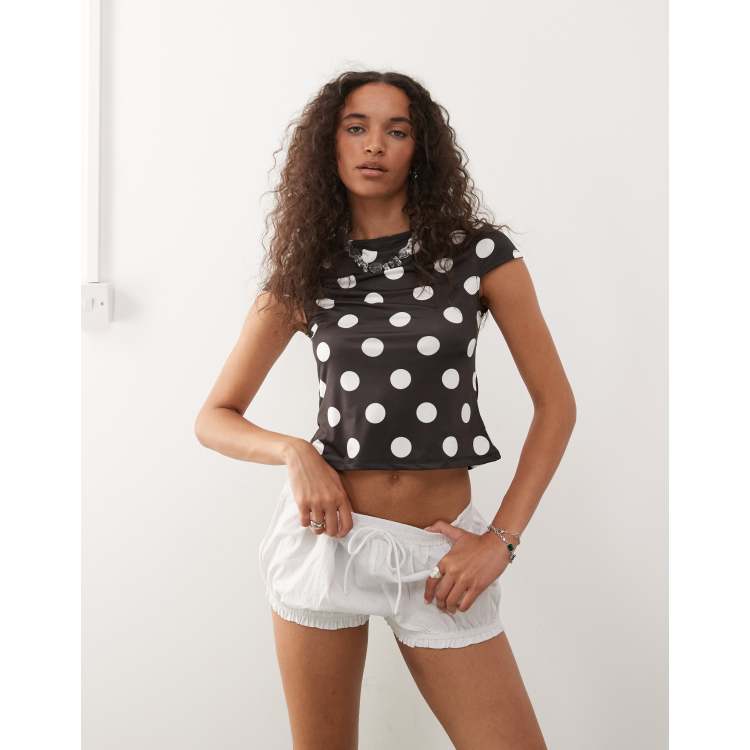COLLUSION cap sleeve slash neck top in large black and white polka