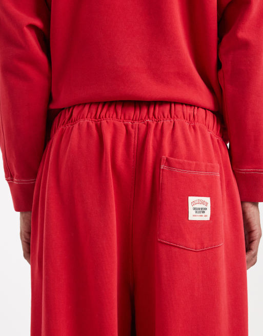 COLLUSION Circular Design Collection heavyweight straight leg trackies in washed red, 4 of 5