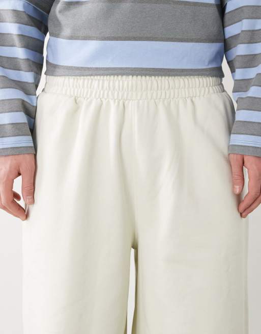 COLLUSION – Circular Design Collection – Naturvita, kraftiga, långa shorts, 4 av 5
