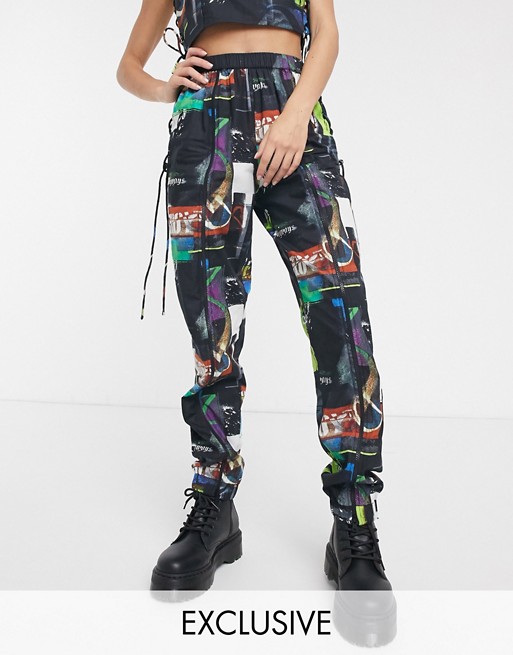 COLLUSION collage print joggers with zip front and side latice
